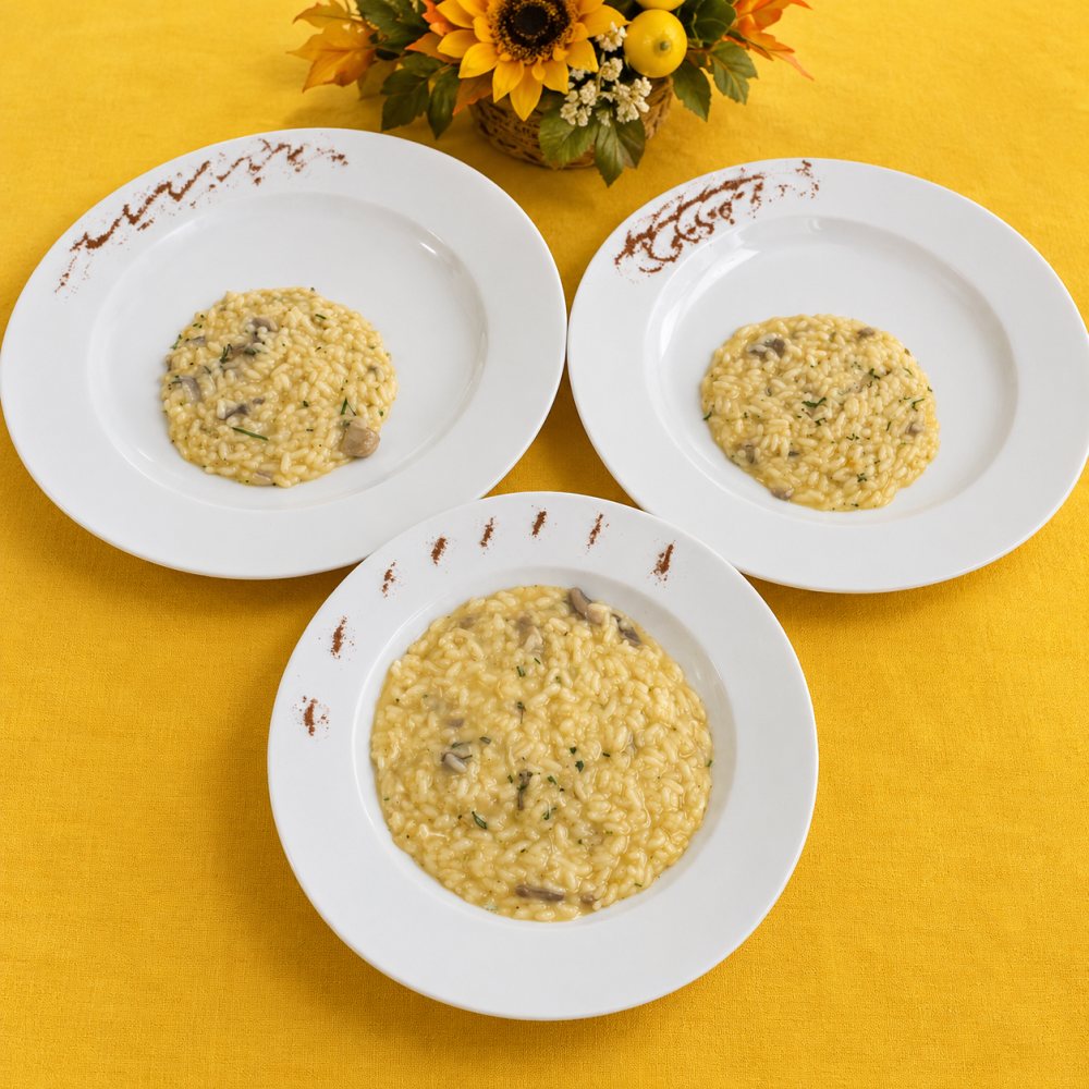 Tre piatti di risotto ai funghi
